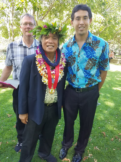 Rob Kajiwara (right) with H.E. Leon Siu, Minister of Foreign Affairs of the Hawaiian Kingdom (left) at an award ceremony. Dr. Leon Watson of Hawaii Tokai International College is in the back.