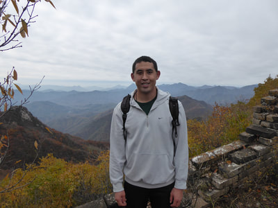 Rob Kajiwara on the Great Wall of China.