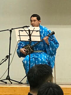Rob Kajiwara sanshin performance traditional Okinawan music